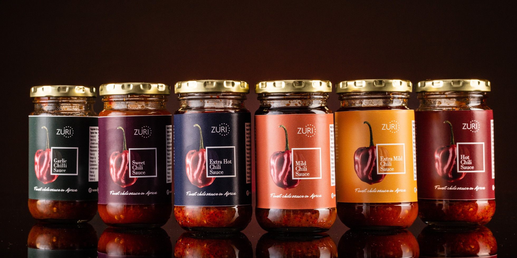 Our Sauces — Zuri Maison chili sauce jars